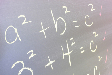 This is a photo of a chalkboard with the Pythagorean relationship written on it.