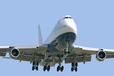 This shows a photo of a 747 plane preparing to land.