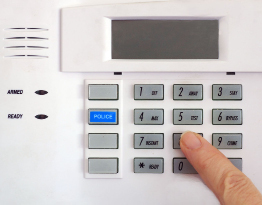 This shows a photo of a home security system panel.