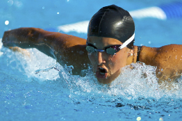 This shows a photo of an athlete competing in a swimming event.