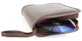 This shows a photo of a CD emerging from an unzipped CD wallet.