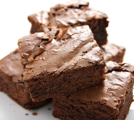 This photo shows a closeup of brownie squares.