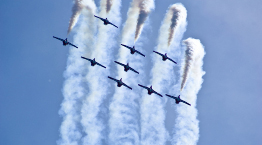 This shows a photo of the Canadian Forces 431 Air Demonstration Squadron, also called the Snowbirds, flying in formation.
