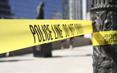 This is a picture of police tape securing a crime scene.