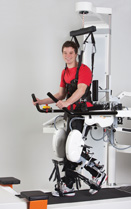 This photo is of a man walking on a treadmill.
