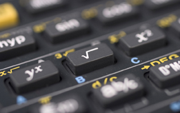 This photo shows a radical (square root) button on a calculator keyboard.