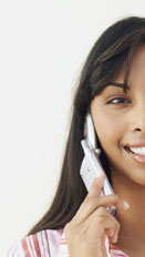 This is a photo of a woman using a cellphone.