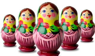 This photograph is of colourful wooden Russian matryoshka dolls.