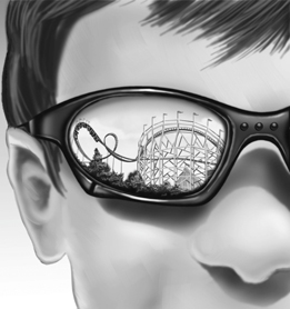 This is an image of a rollercoaster reflected in a boy’s sunglasses.