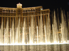 This shows a photo of the Fountains of Bellagio in Las Vegas at night.