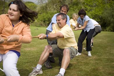 This is a photo of children playing tug of war.