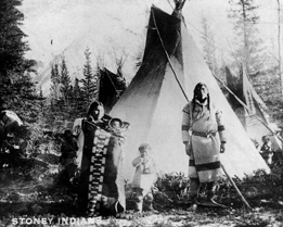 This is a photo of people from the Nakoda First Nations in front of their tepee at Banff in 1906.