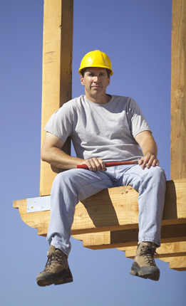 In this photo a carpenter takes a break.