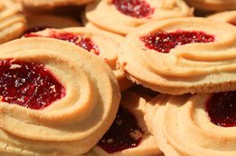This photo is of a collection of strawberry shortbread cookies.