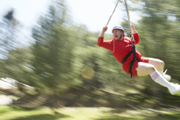 This is a photo of a rider on a zip line.