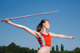 This is a photo of a female athlete preparing to throw a javelin.