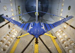 In this photo a model of a joined-wing aircraft is being tested at NASA’s wind tunnel at the Langley Research Center.