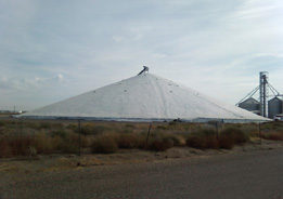 This is a photo of a conical grain-pile cover.