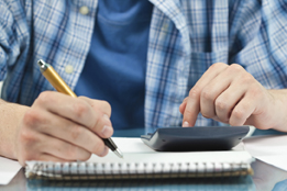 This is a picture of a student using a calculator. 