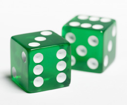 This photograph shows two green dice.