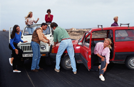 This photo shows a group of young adults involved in a car accident.