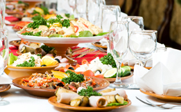This is a picture of a table with plates of food.