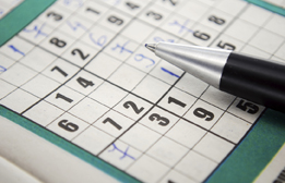 This is a photo of a partially completed game involving a grid of numbers.