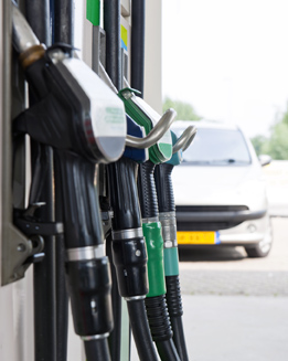 This is a photo of hoses hanging from a gas pump.