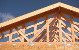 This photograph shows roof trusses.