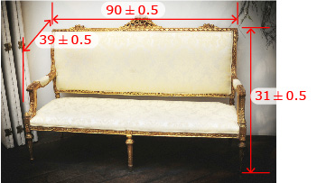 This shows an antique couch with the dimensions ninety plus or minus zero decimal five inches by thirty-nine plus or minus zero decimal five inches by thirty-one plus or minus zero decimal five inches.