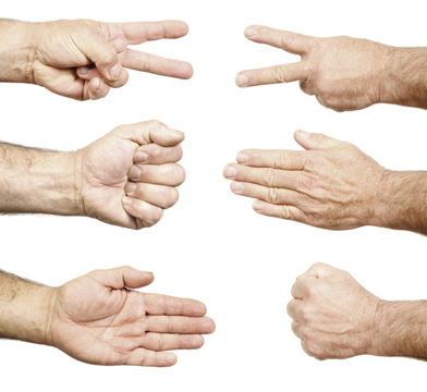 This is a picture showing two hands playing the game rock, paper, scissors.