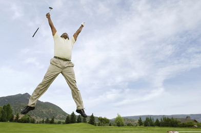This is a photo of a golfer celebrating on the golf course.