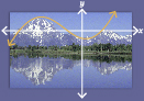 This is a picture of mountains with a cubic curve and x- and y-axes superimposed. The curve crosses the x-axis in three places.