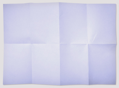 This is a photo of a blank piece of paper with fold lines.