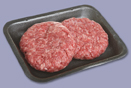 This is a photo of two uncooked hamburgers.