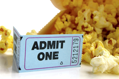 This shows a photo of popcorn and an admission ticket.
