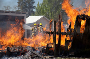 This is a photo of firefighters working to put out a fire.