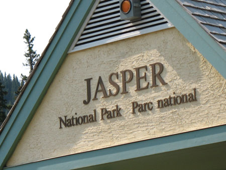 A photograph shows a toll booth at the entrance to Jasper National Park.