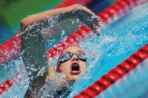 This photo is of a swimmer taking a breath while doing the front crawl.