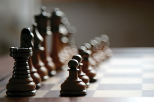 Chess pieces are lined up.