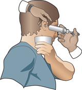 A buildup of wax in the auditory canal which interferes with conduction of sound waves toward the tympanum has to be removed by a physician by using a syringe.  Never try this on your own.