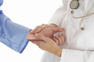 This photograph shows the correct finger placement when taking a pulse at the wrist. Pulse is a measurement of heart rate.