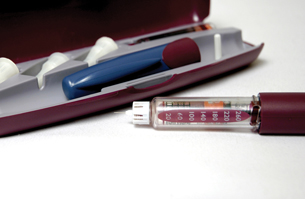 This photograph shows an insulin pen. Insulin injection pens are a technology developed to make it easier to administer predetermined insulin doses especially when a diabetic is not at home.