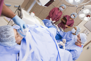This photograph shows a female patient having eggs retrieved using vaginal ultrasound.