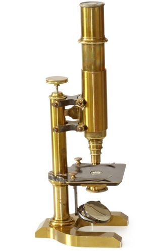 This photo shows an old-fashioned microscope, of the type commonly used in the early stages of scientific work with the cell.