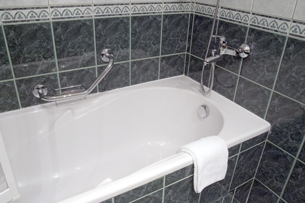 A photograph of a bathtub.