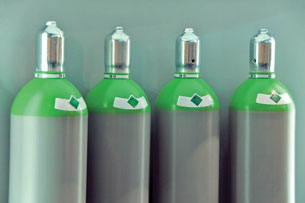 A photograph of storage cylinders for gases.