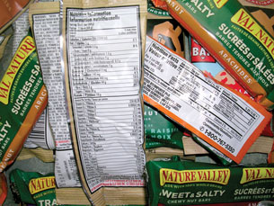 A photograph shows the nutrition information label on the back of a package of food.