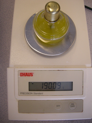 Photo 18: This photograph shows the spirit burner filled with biodiesel on the balance so that the final mass can be read.