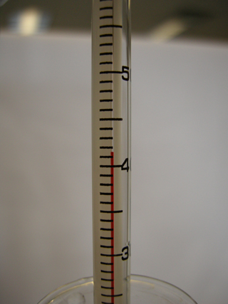 Photo 17: This photograph shows a thermometer displayed so that the final water temperature can be read.